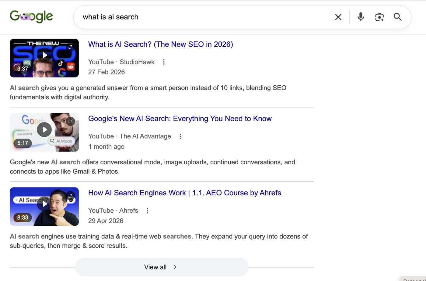 Google results page for the query what is ai search, showing a video carousel with three YouTube results ranking above traditional listings