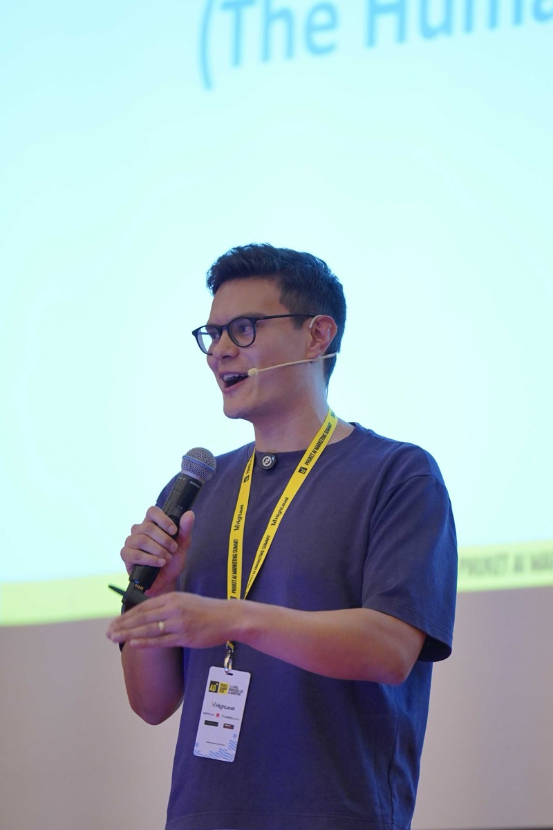 Lawrence Hitches presenting on stage at Phuket AI Marketing Summit 2026
